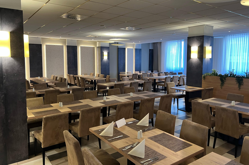 Dining room at the NOVINA Hotel at Südwestpark Nuremberg without guests.