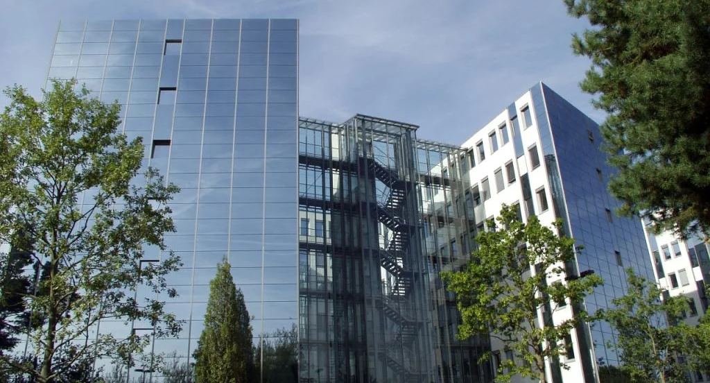 Exterior view of the glass facade of the six-floors buildings 63 to 65 in Südwestpark Nuremberg